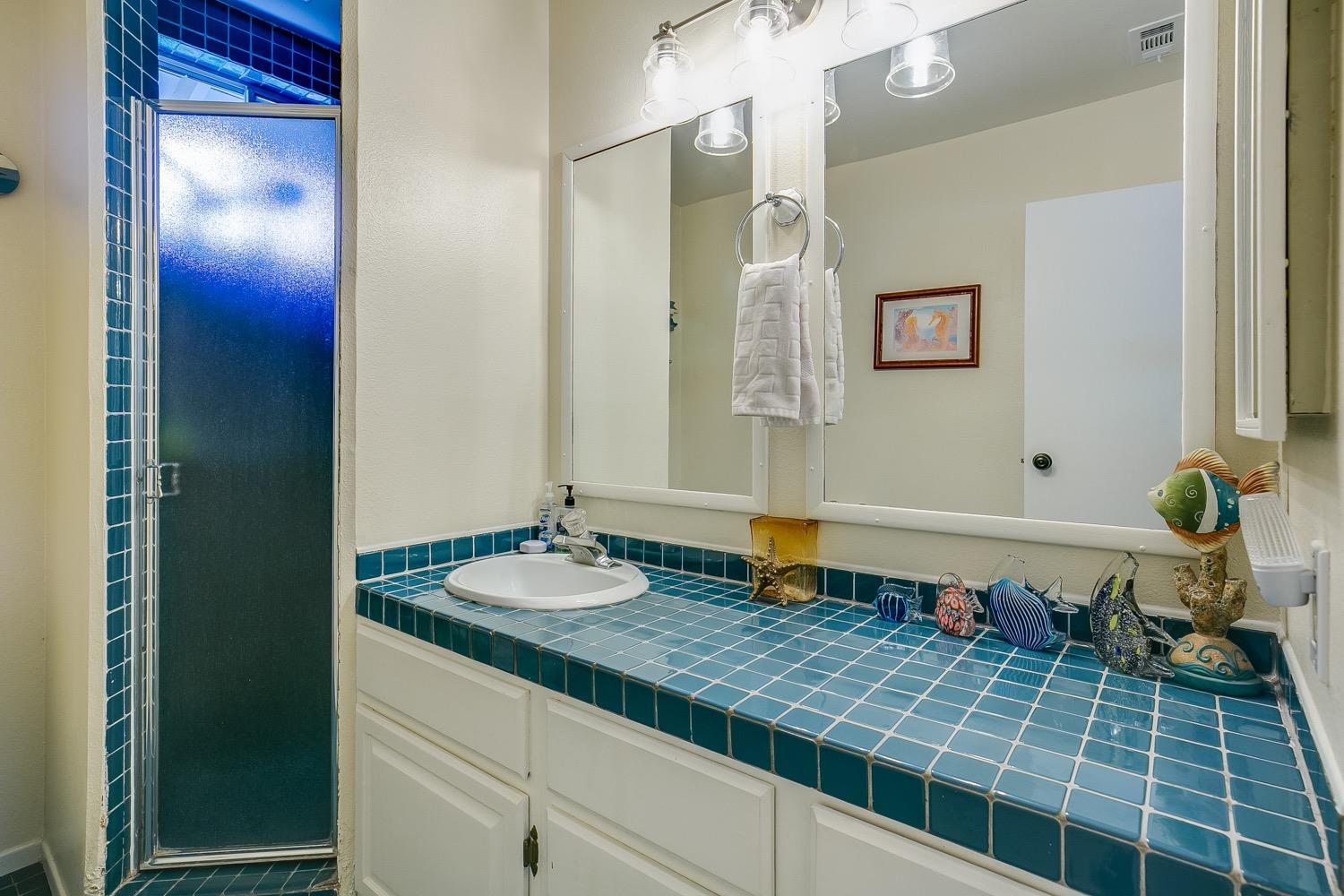 804 Daly Road Ojai, CA 93023 - Photo 18 of 38 a bathroom with a sink and a mirror