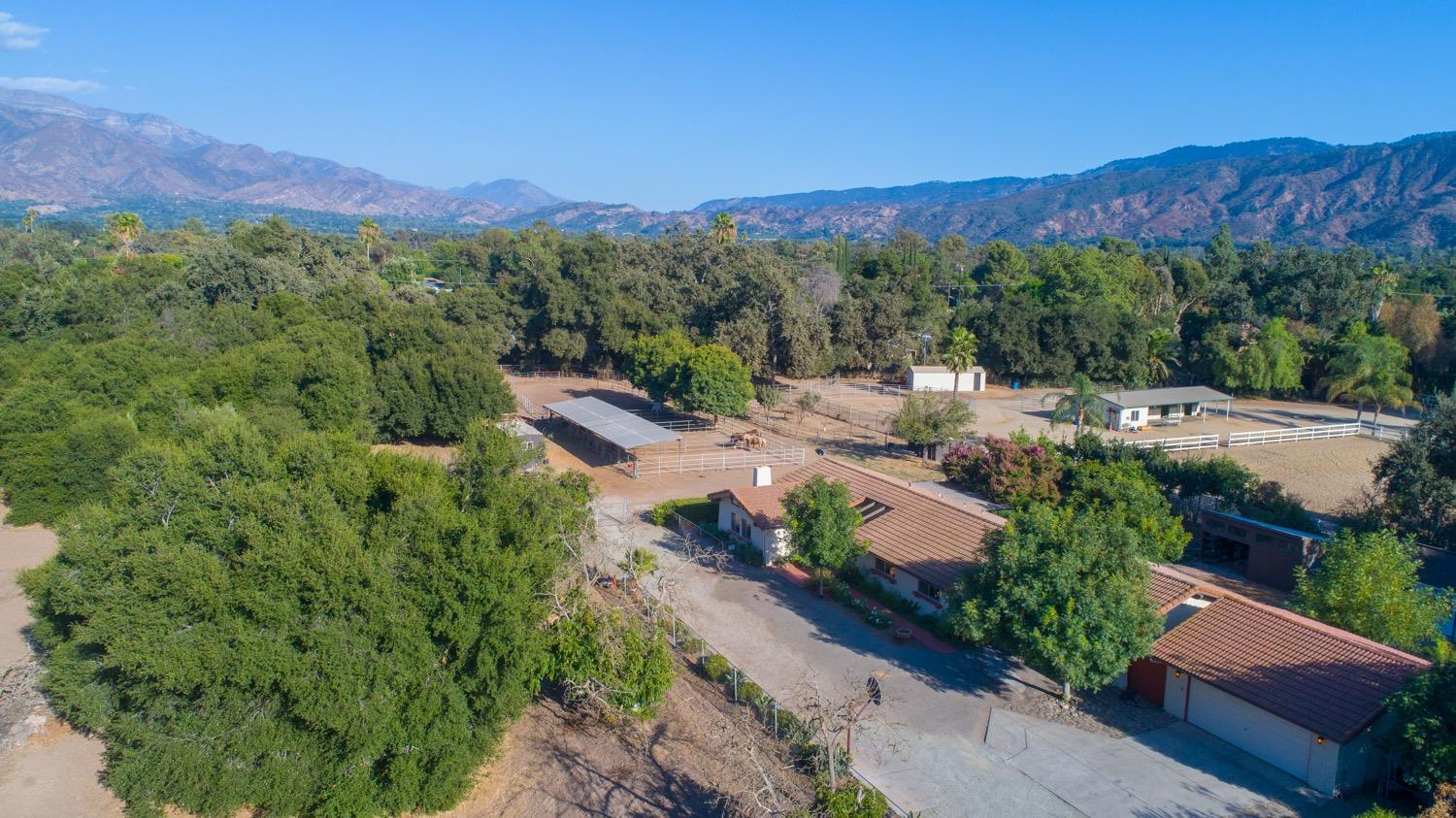 804 Daly Road Ojai, CA 93023 - Photo 28 of 38 a view of a lush green hillside and a building