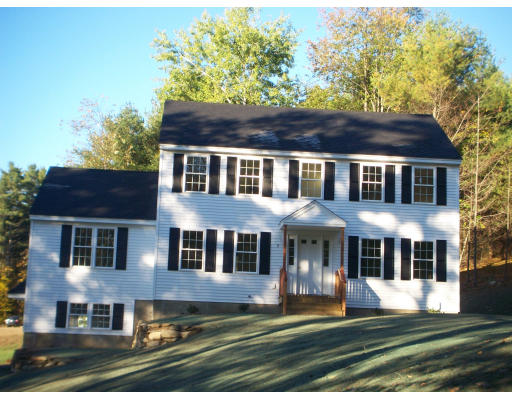 7 Hardy Road Ashburnham, MA 01430 - Photo 1 of 6 front view of a house with a yard