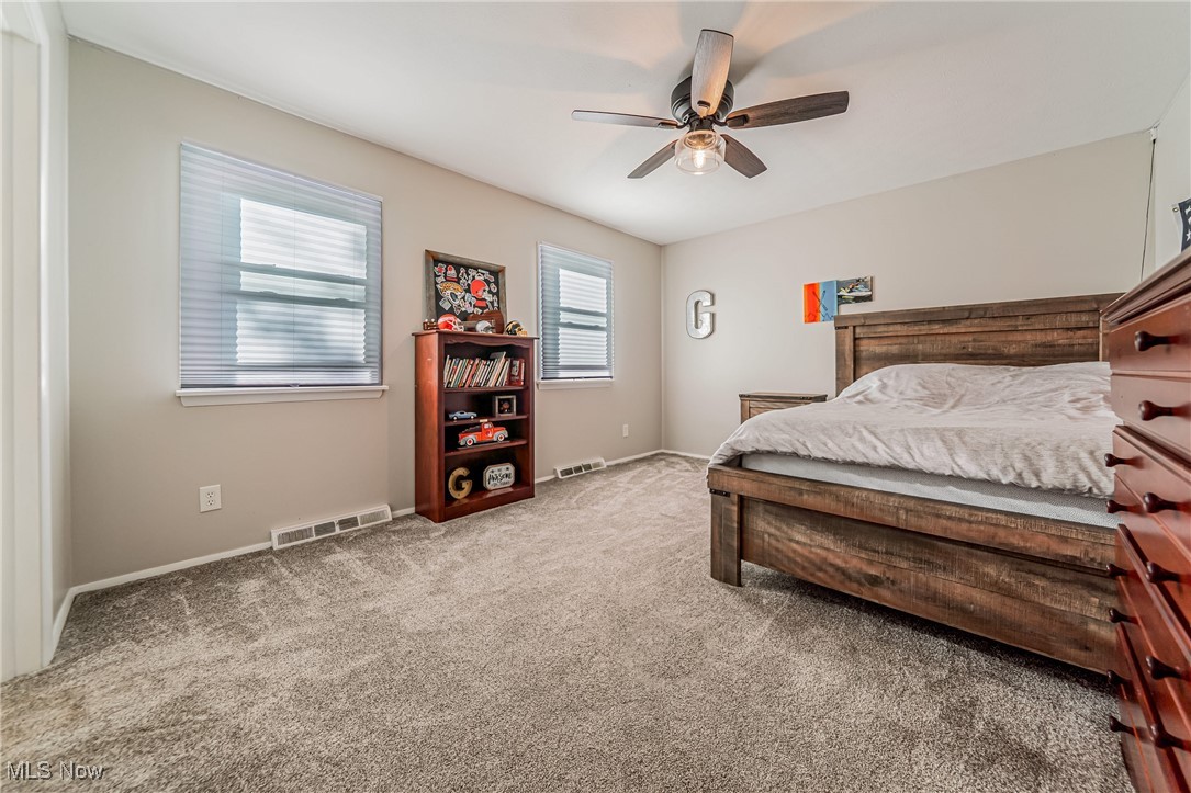 595 Moorfield Road Fairlawn, OH 44313 - Photo 26 of 50 Bedroom featuring carpet floors and a ceiling fan