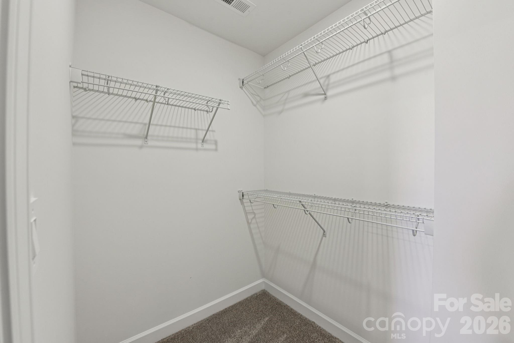 323 Golden Maple Court Fort Mill, SC 29708 - Photo 15 of 22 a view of a room with racks on the wall