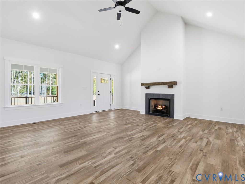 3706 Broad St Road Gum Spring, VA 23065 - Photo 11 of 34 an empty room with windows and fireplace