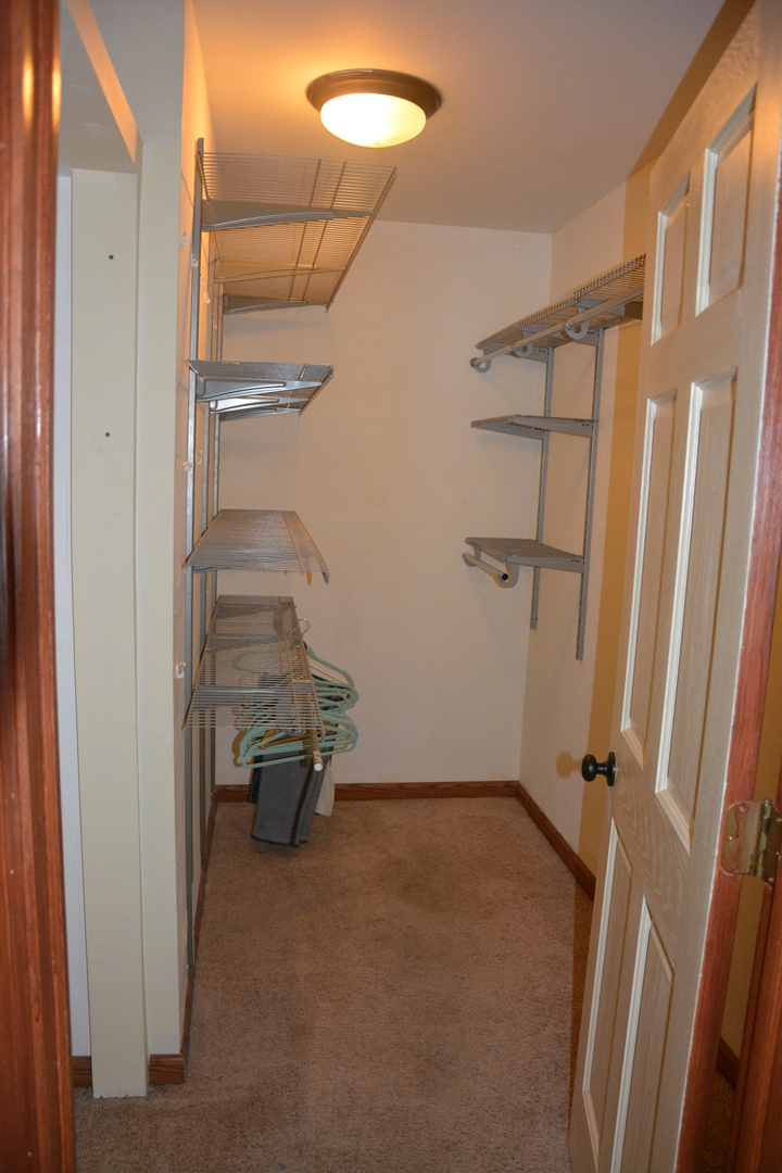711 Tipperary Court, Unit 2D Schaumburg, IL 60193 - Photo 12 of 17 a room with table and chairs