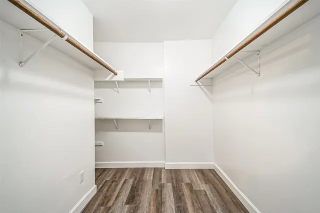 a view of an empty walk in closet