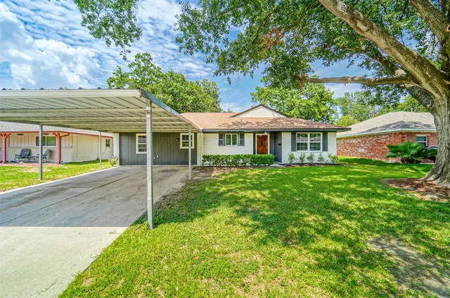 a view of a house with a swimming pool