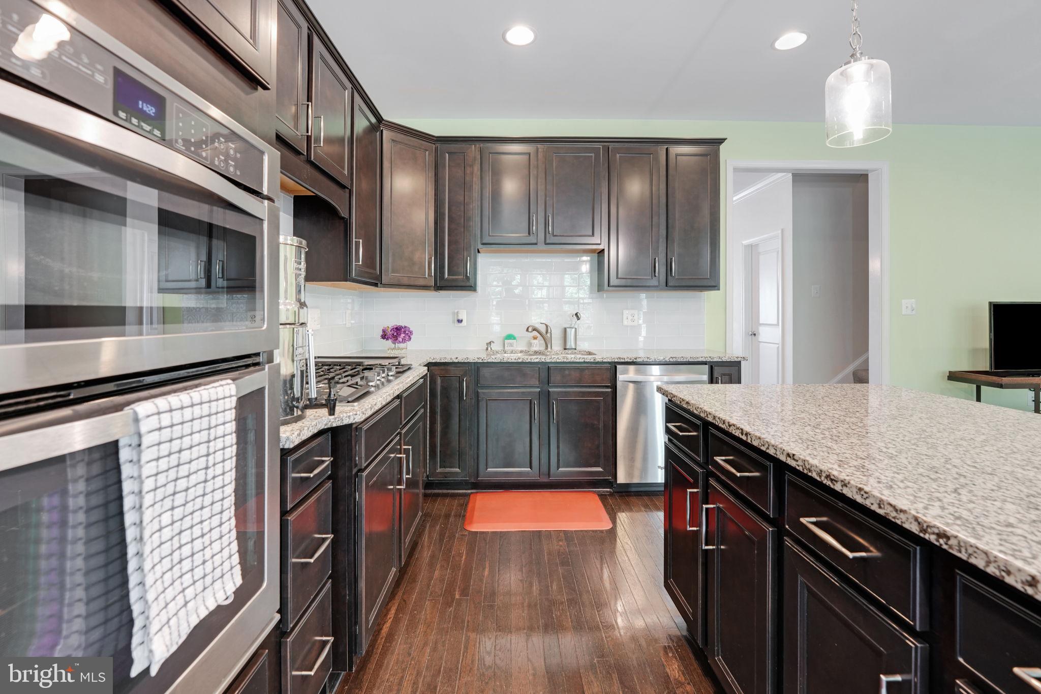 23339 Tradewind Drive Brambleton, VA 20148 - Photo 16 of 54 Granite countertops