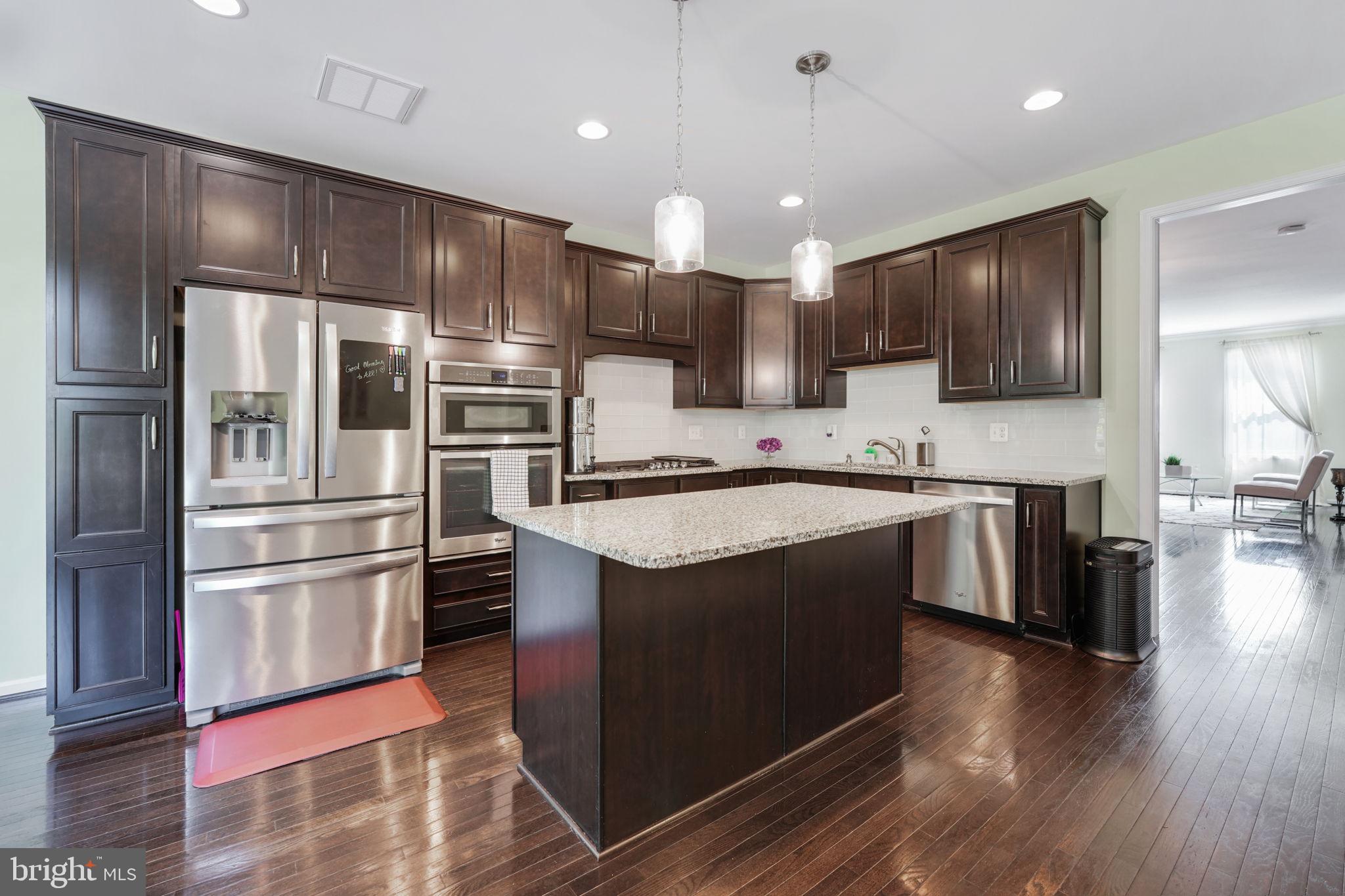23339 Tradewind Drive Brambleton, VA 20148 - Photo 7 of 54 Kitchen island