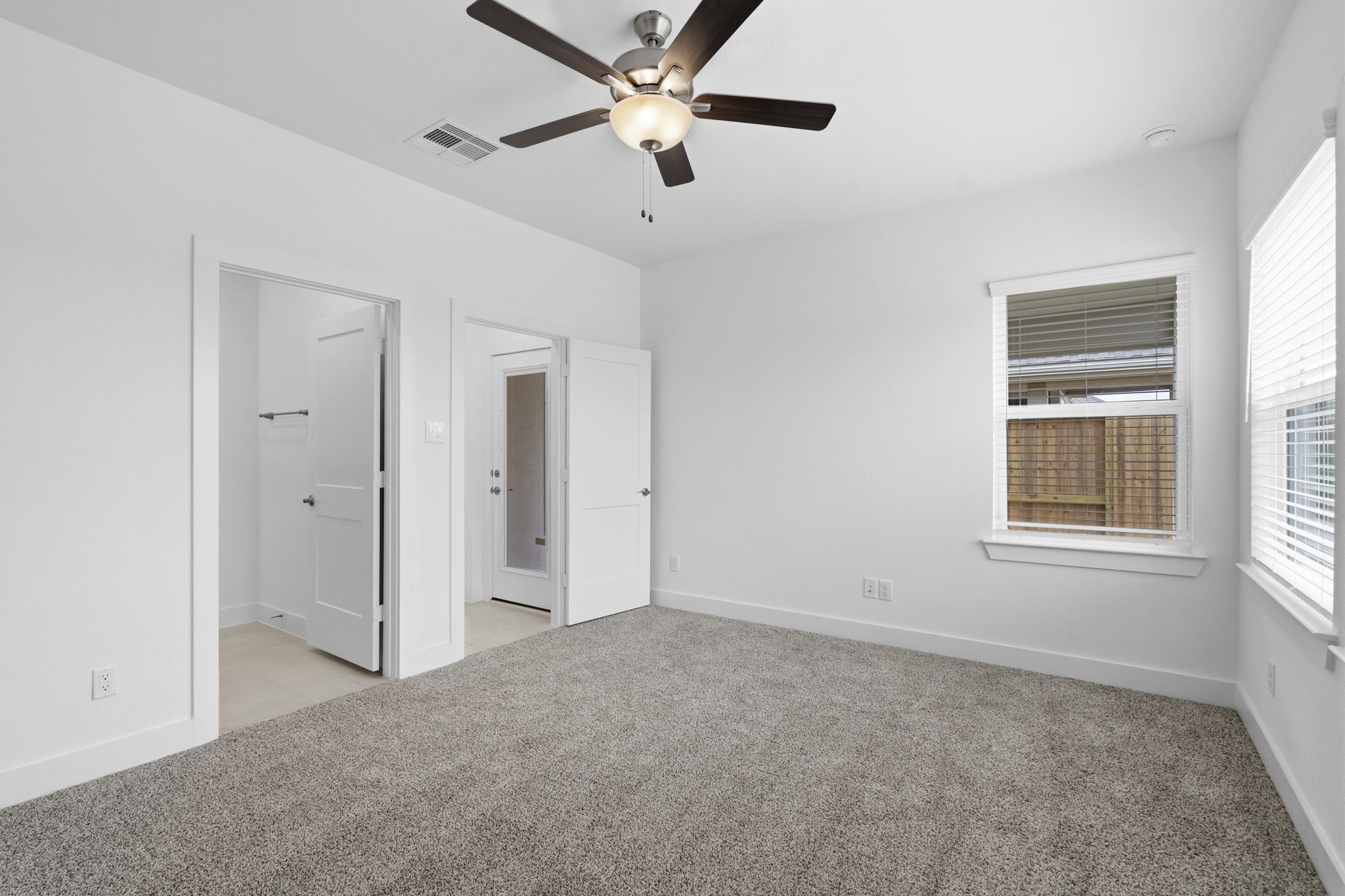 5251 Celestial Court Rosharon, TX 77583 - Photo 23 of 46 a view of an empty room with a window