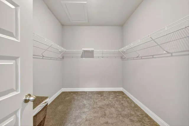 a view of a room with racks on the wall