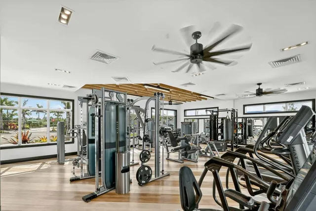 a view of a livingroom with furniture water view