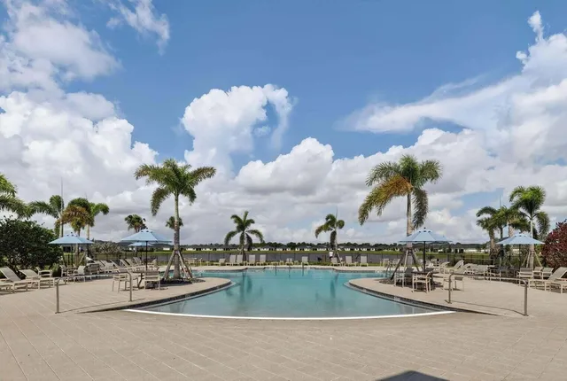 a view of a swimming pool and a terrace