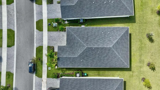 an aerial view of a house having swimming pool