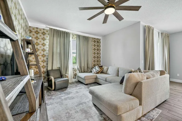 a living room with furniture and a window