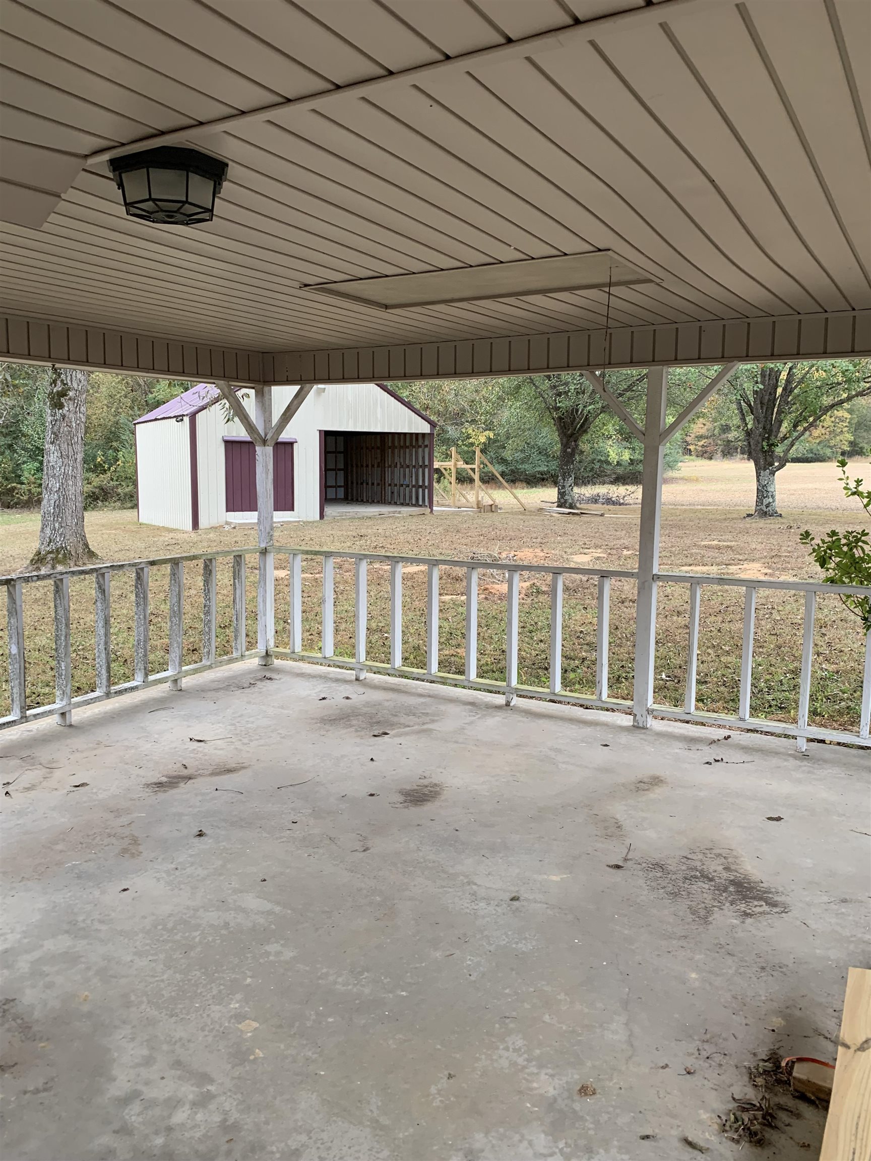 7641 Highway 45 Ramer, TN 38367 - Photo 5 of 24 a front view of a house with a yard