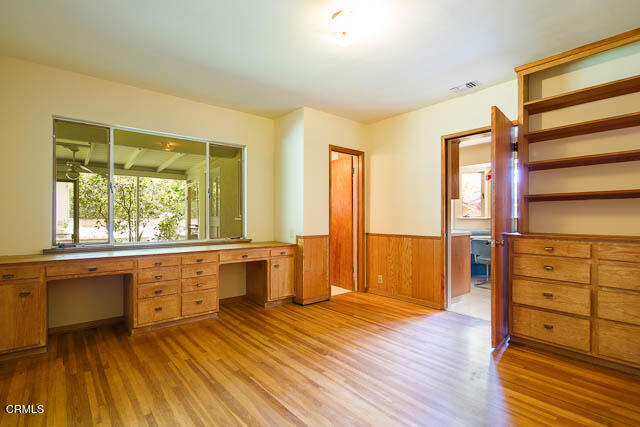 3665 Shadow Grove Road Pasadena, CA 91107 - Photo 19 of 27 a large space with a window and wooden floor