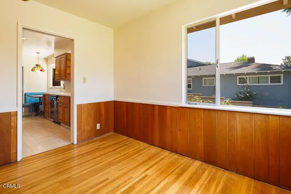 a view of a bedroom with bathroom
