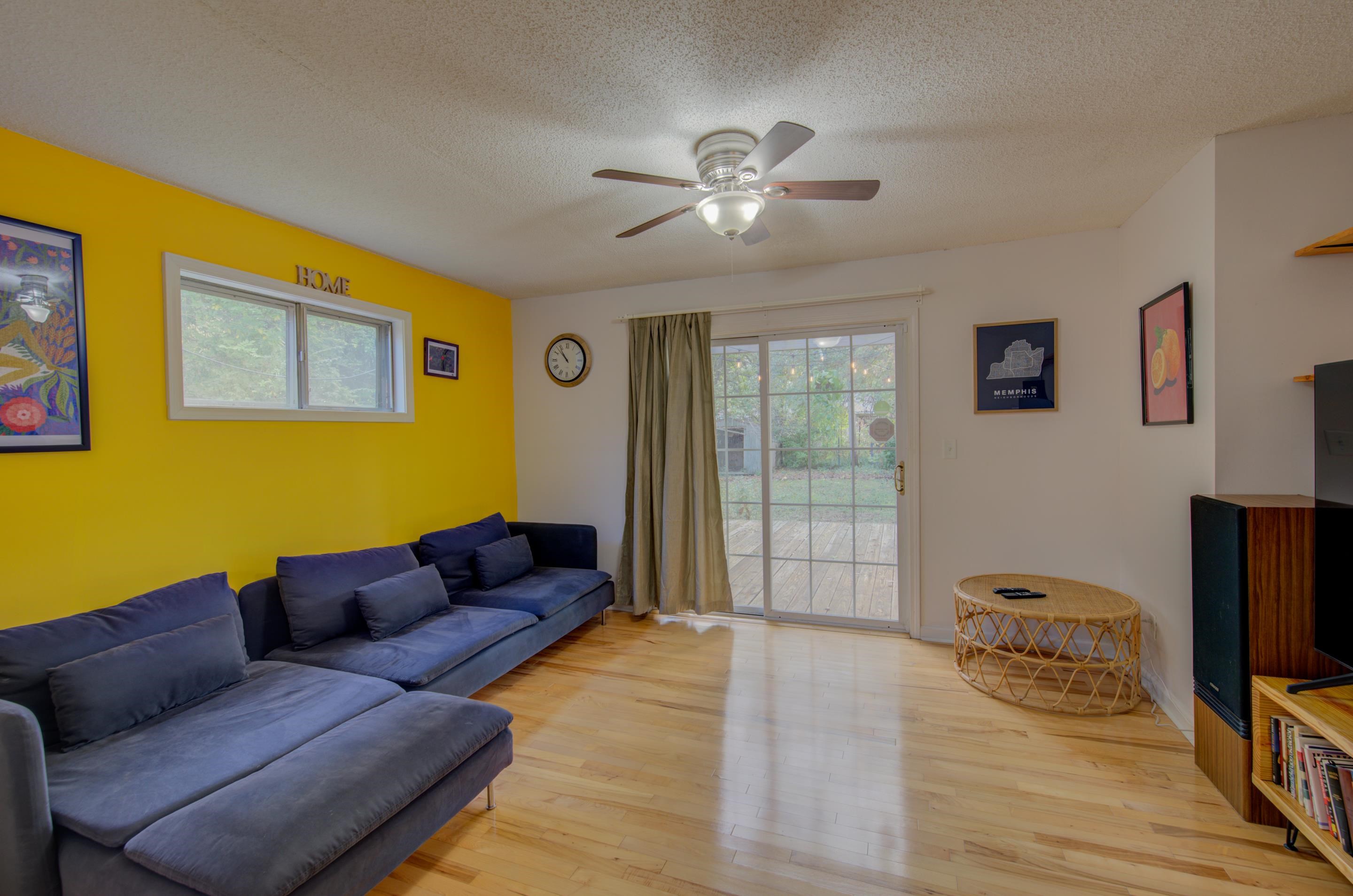 4565 Monaco Road Memphis, TN 38117 - Photo 14 of 23 a living room with furniture and a flat screen tv