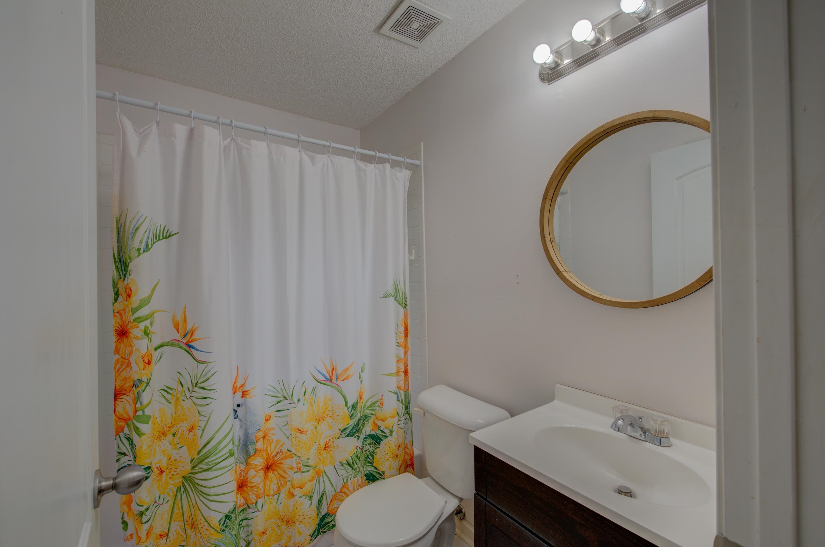 4565 Monaco Road Memphis, TN 38117 - Photo 16 of 23 a bathroom with a sink toilet and shower