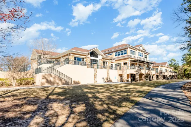 a view of a white building among the street