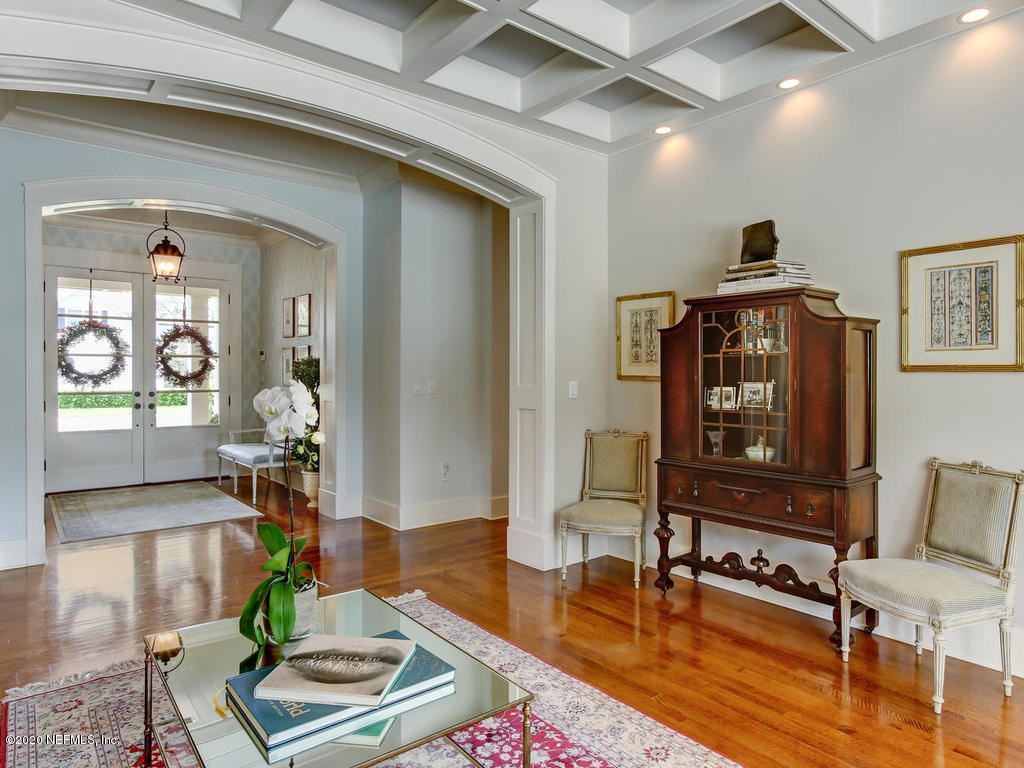 12148 Mandarin Road Jacksonville, FL 32223 - Photo 16 of 132 a living room with furniture and wooden floor