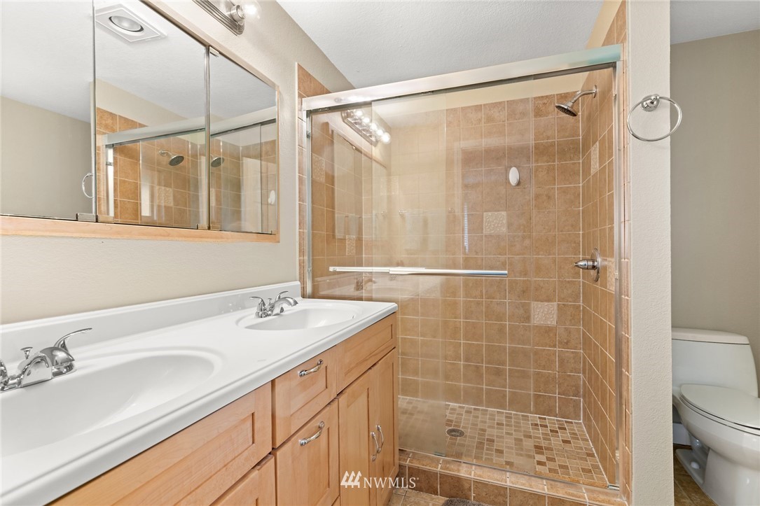 2312 168th Street Southeast Bothell, WA 98012 - Photo 12 of 29 a bathroom with a sink and a mirror