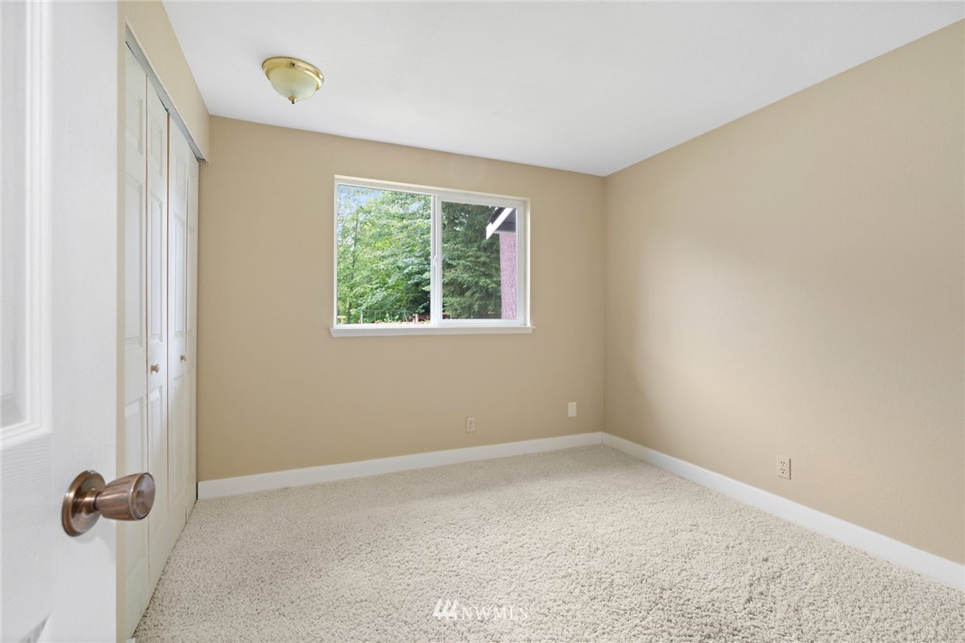 2312 168th Street Southeast Bothell, WA 98012 - Photo 13 of 29 an empty room with windows