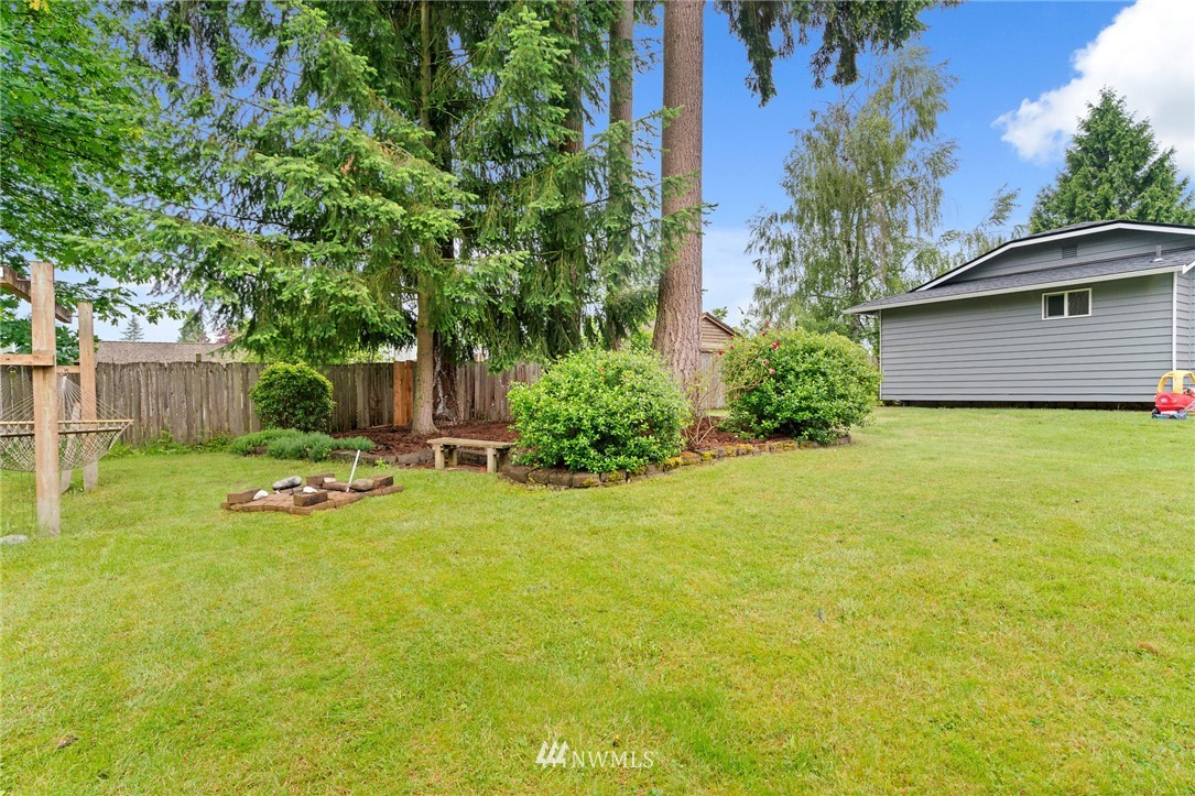 2312 168th Street Southeast Bothell, WA 98012 - Photo 20 of 29 a view of a garden with swimming pool