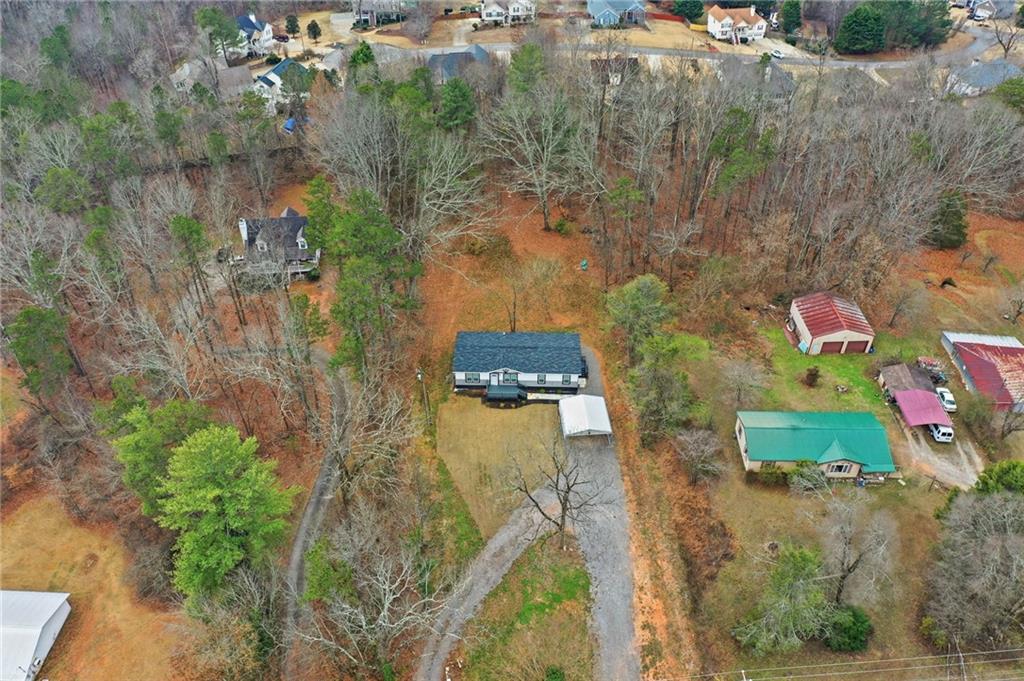 239 Fairview Road Ball Ground, GA 30107 - Photo 12 of 41 a bird view of a house