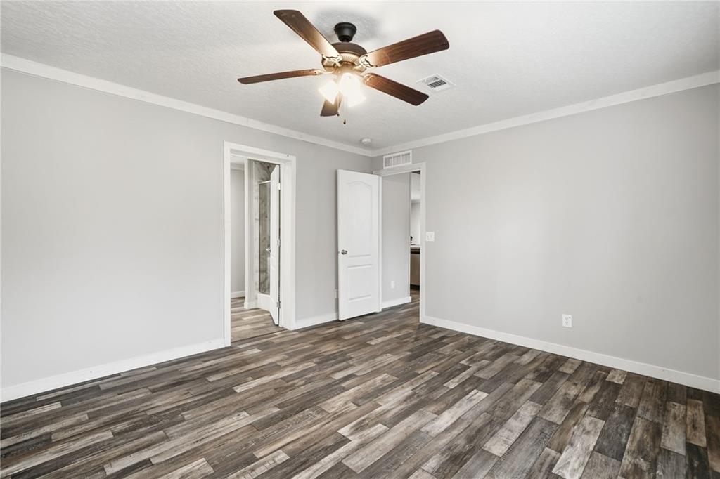 239 Fairview Road Ball Ground, GA 30107 - Photo 30 of 41 wooden floor in an empty room