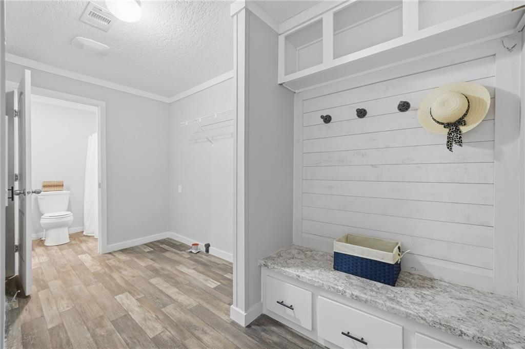 239 Fairview Road Ball Ground, GA 30107 - Photo 41 of 41 a bathroom with a shower