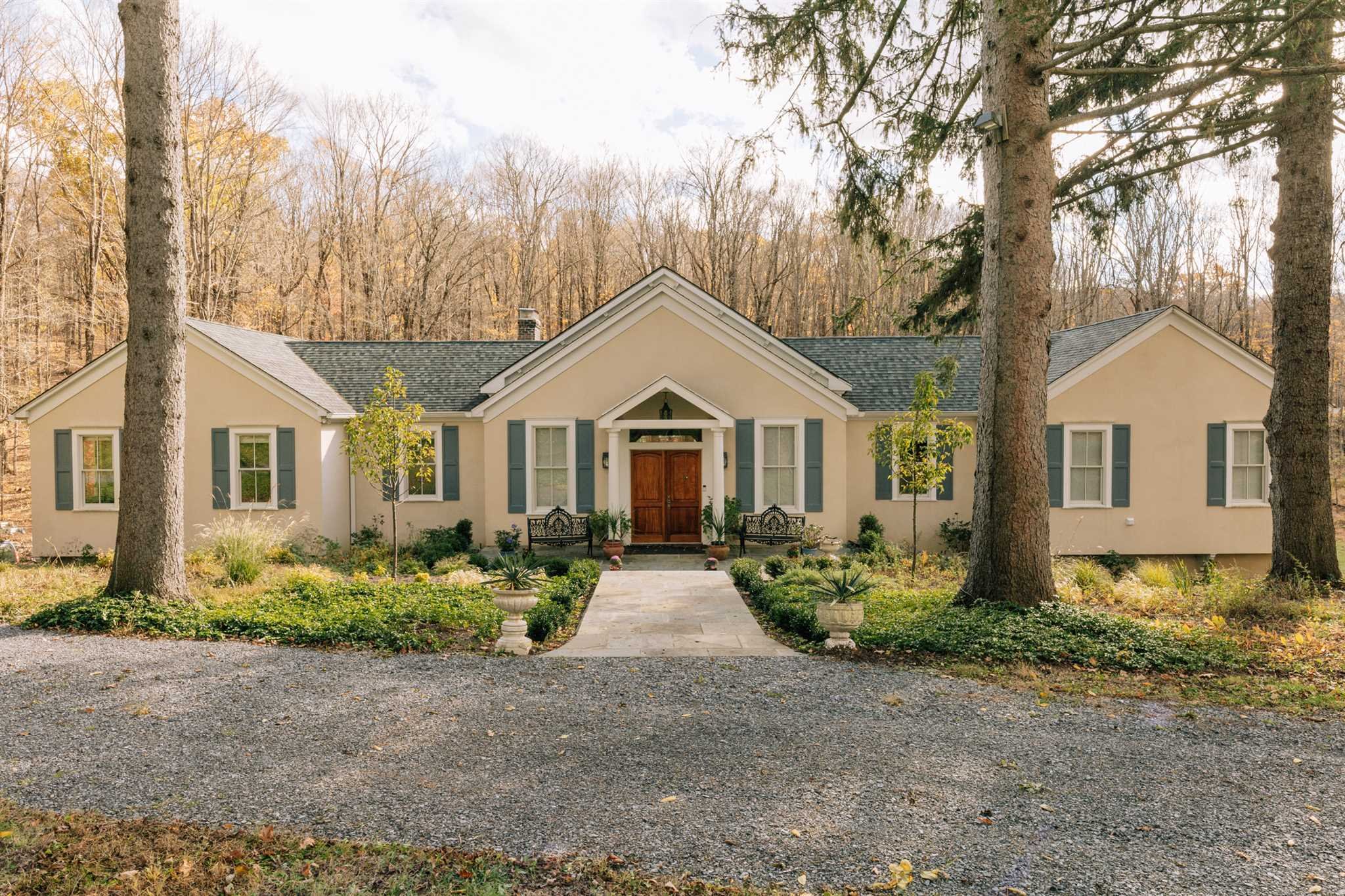 18 Altamont Road Millbrook, NY 12545 - Photo 2 of 35 a front view of a house with garden