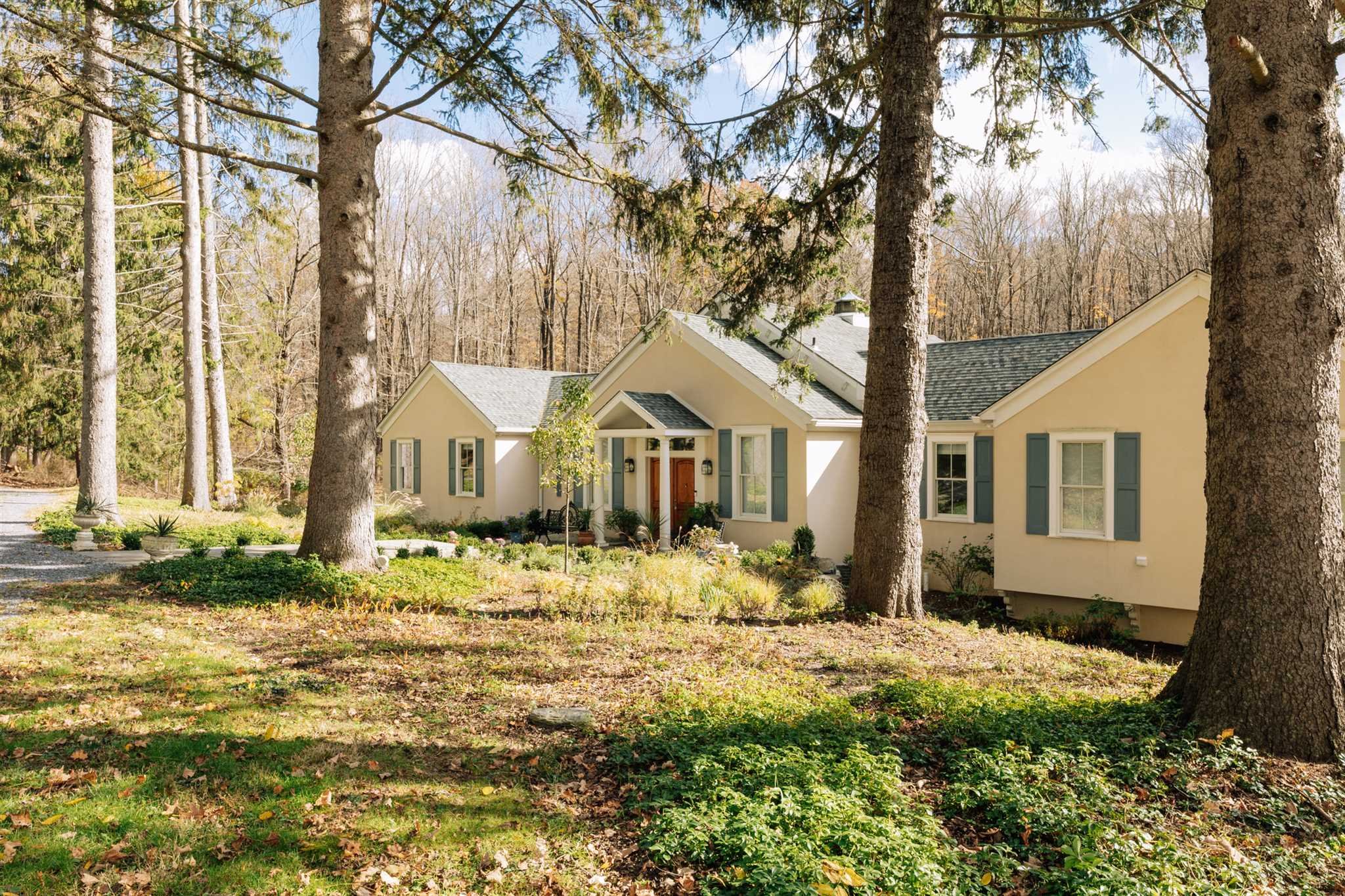 18 Altamont Road Millbrook, NY 12545 - Photo 3 of 35 a front view of a house with a yard