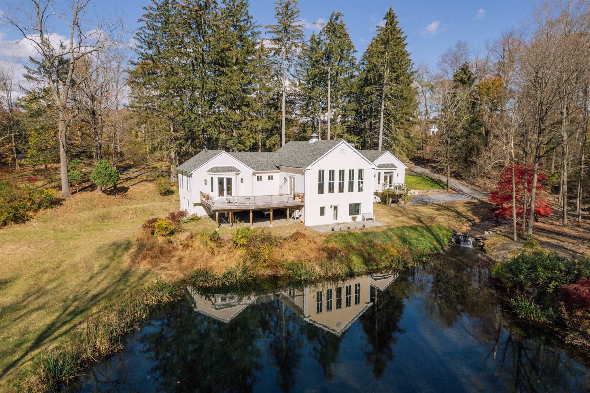 18 Altamont Road Millbrook, NY 12545 - Photo 6 of 35 a view of a house with roof deck and sitting area