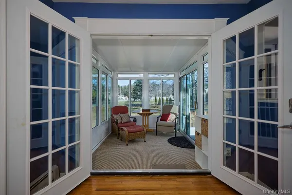a view of living room with furniture and window