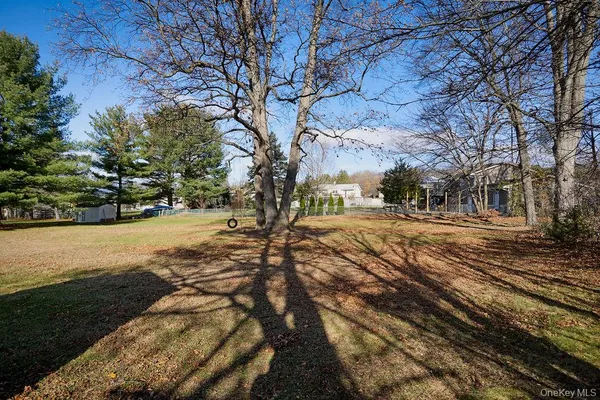 a view of road with trees