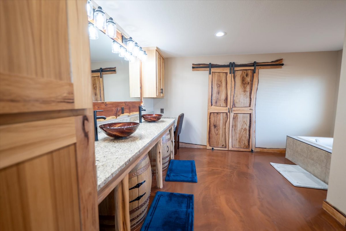 1825 Savanna Ridge Ranch Road Lometa, TX 76853 - Photo 11 of 35 a kitchen with a refrigerator and a stove top oven