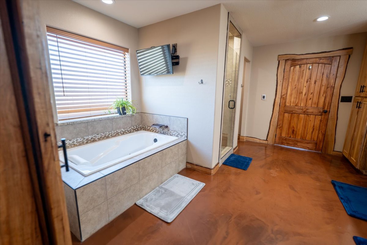 1825 Savanna Ridge Ranch Road Lometa, TX 76853 - Photo 12 of 35 a bathroom with a tub sink and mirror