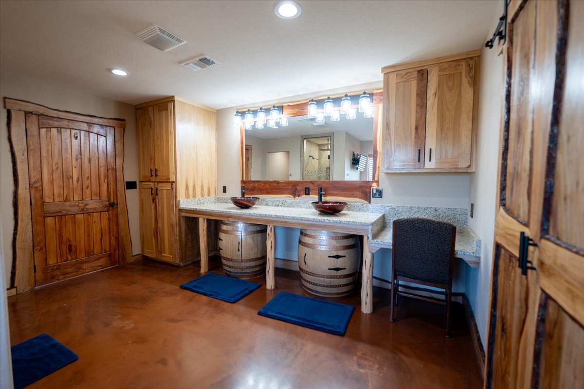 1825 Savanna Ridge Ranch Road Lometa, TX 76853 - Photo 15 of 35 Bathroom featuring concrete floors, vanity, and recessed lighting