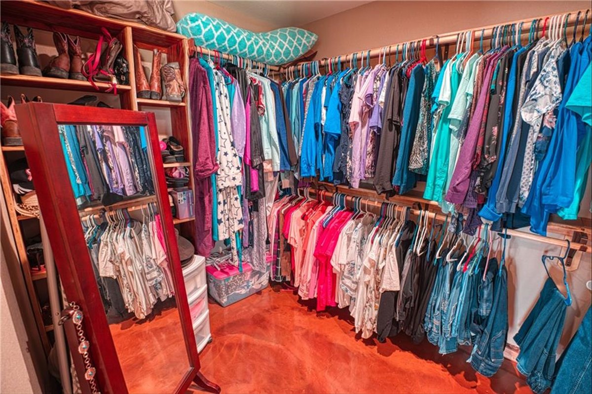 1825 Savanna Ridge Ranch Road Lometa, TX 76853 - Photo 16 of 35 a view of walk in closet with clothes
