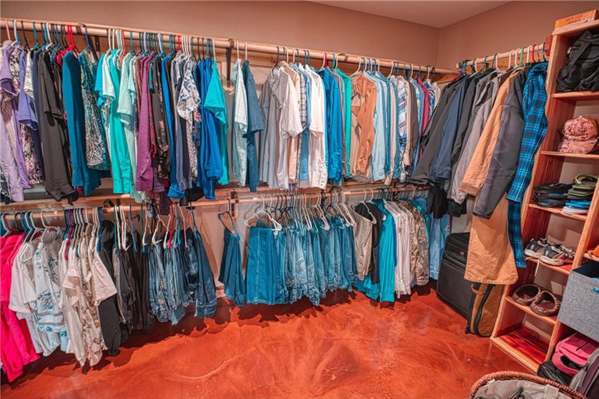 1825 Savanna Ridge Ranch Road Lometa, TX 76853 - Photo 17 of 35 a view of walk in closet with clothes