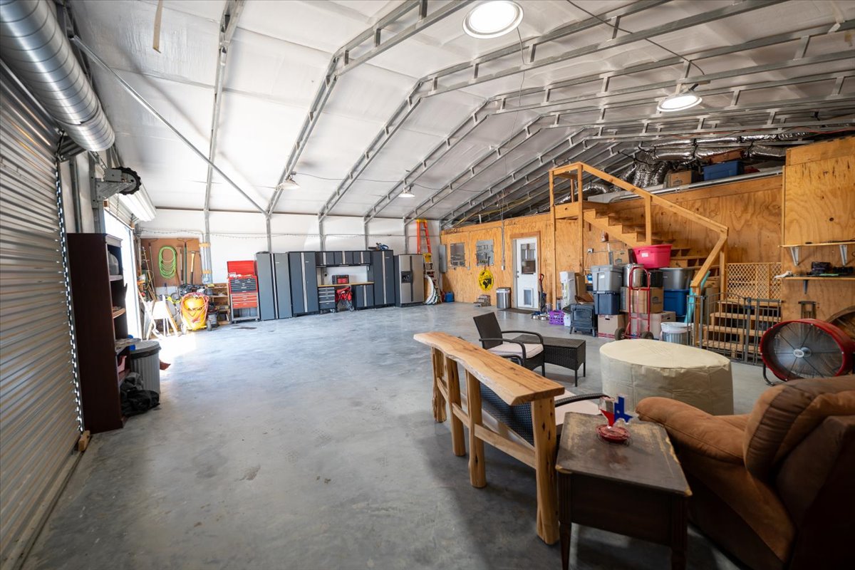 1825 Savanna Ridge Ranch Road Lometa, TX 76853 - Photo 25 of 35 a view of a storage room with a table and chairs
