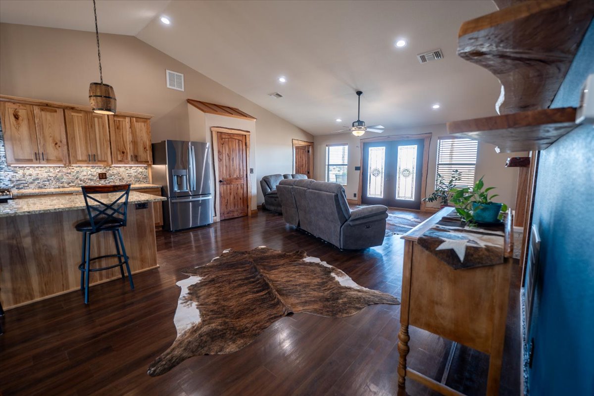 1825 Savanna Ridge Ranch Road Lometa, TX 76853 - Photo 4 of 35 a living room with furniture kitchen and a table
