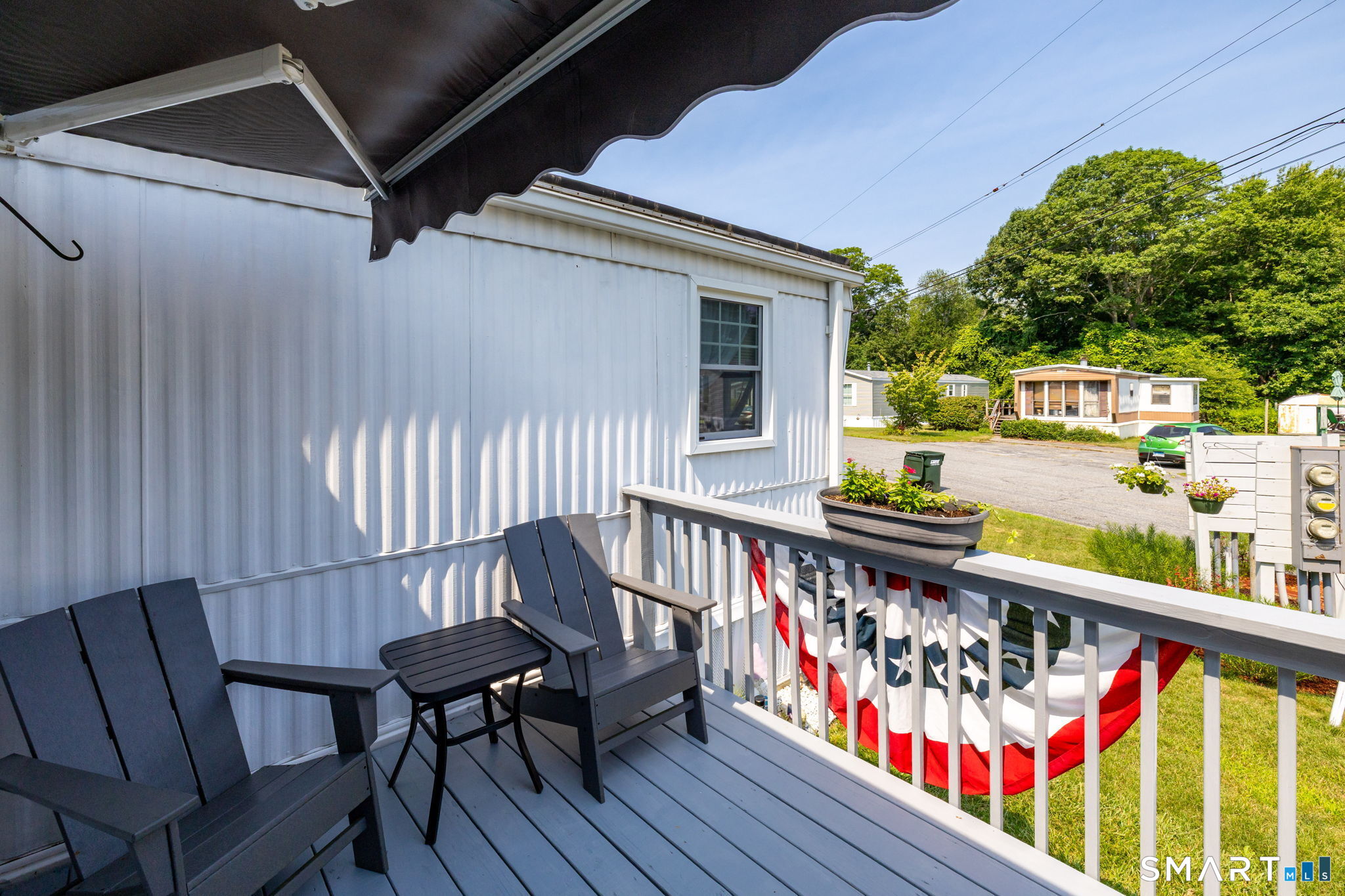 301 Buddington Road Groton, CT 06340 - Photo 21 of 34 a view of a balcony with chairs