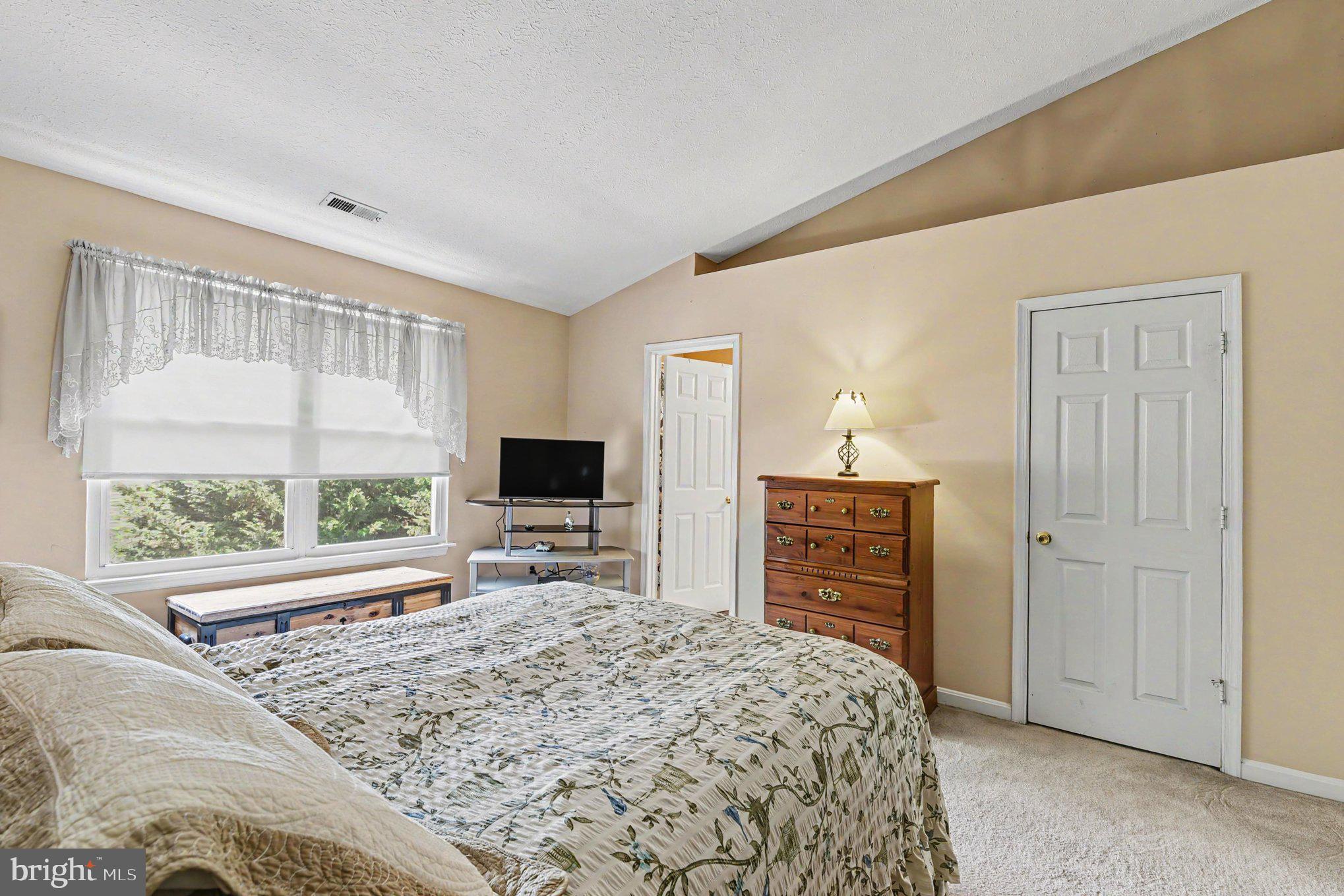 72 Powder View Court Nottingham, MD 21236 - Photo 22 of 26 Serene bedroom with vaulted ceiling.