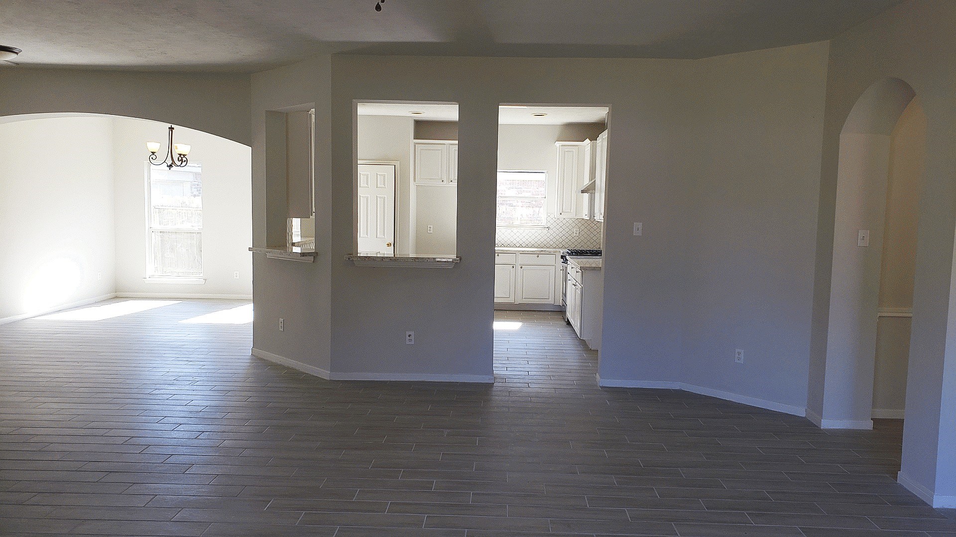 3710 Ransom Road Richmond, TX 77469 - Photo 12 of 42 a view of a hallway with wooden floor