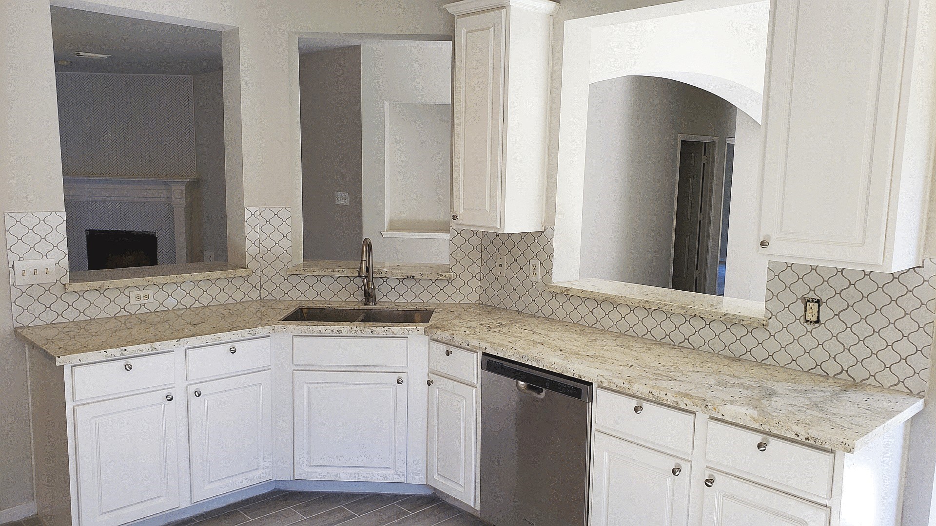 3710 Ransom Road Richmond, TX 77469 - Photo 16 of 42 a sink with white cabinets