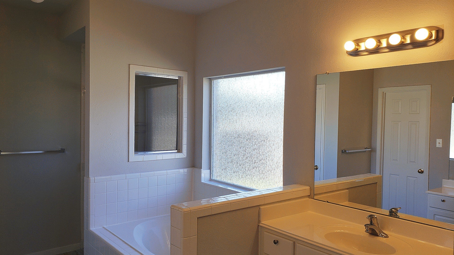3710 Ransom Road Richmond, TX 77469 - Photo 21 of 42 a bathroom with a sink and a mirror