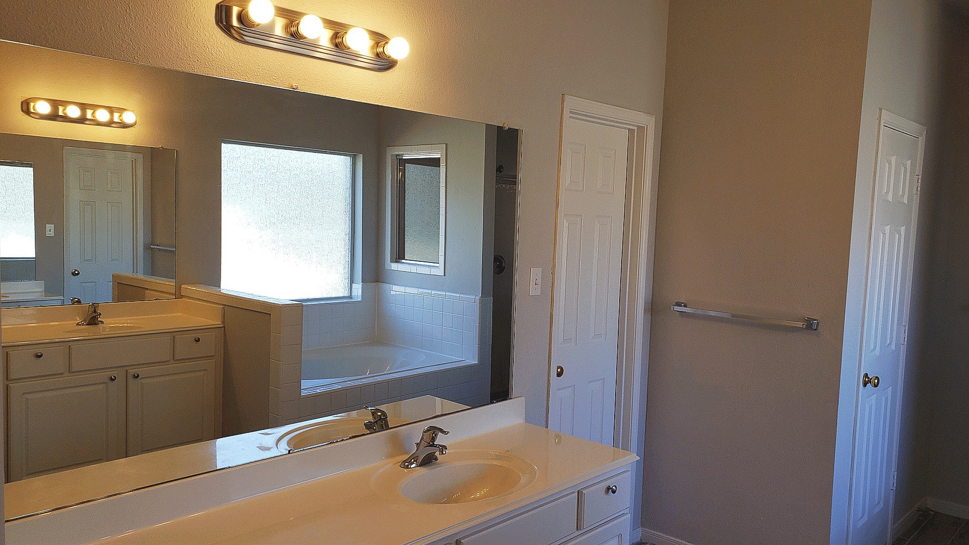 3710 Ransom Road Richmond, TX 77469 - Photo 22 of 42 a bathroom with a sink and a mirror