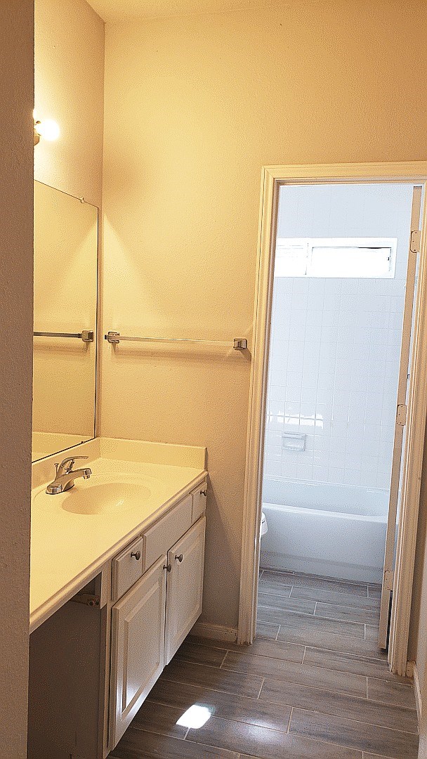 3710 Ransom Road Richmond, TX 77469 - Photo 31 of 42 a bathroom with a sink and a mirror
