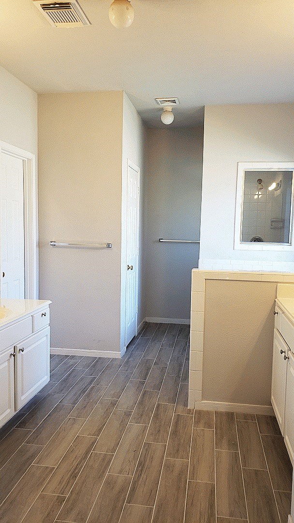 3710 Ransom Road Richmond, TX 77469 - Photo 33 of 42 a view of a room with wooden floor and cabinet